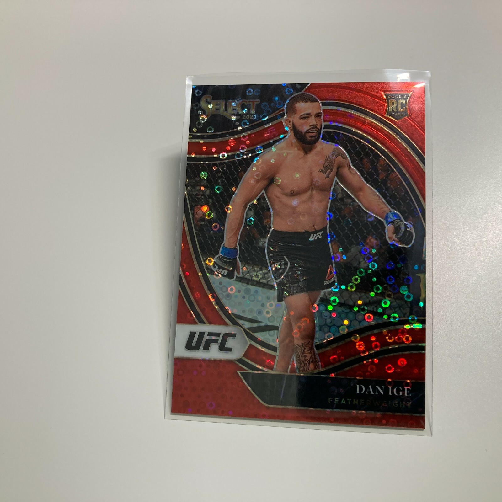 Dan Ige 2021 Panini Select UFC Octagonside Red Disco Prizm RC Card 42/199 #229