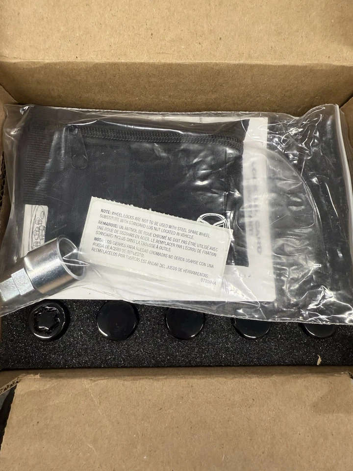 Juego de bloqueo de rueda de tuerca negra Mazda C9S3V9790 nuevo en caja 16 tacos + 4 cerraduras 21 mm 3 5 6 Foto 4 de 4