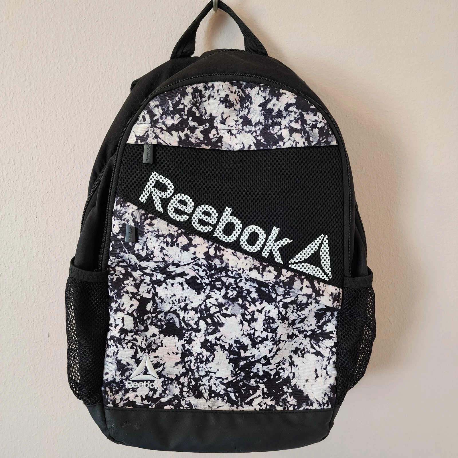 Zaino donna Reebok Isla nero e rosa spackle 17 25" con tasca tecnica