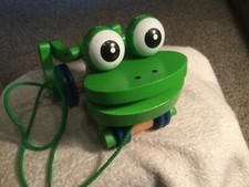 Melissa  Doug FIRST PLAY Frolicking Frog Wooden Pull Toy Bounces Bobs