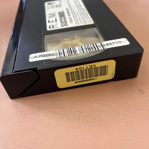 R.E.M. Succumbs (VHS, 1987) REM. Pre-Owned BROWN CLAMSHELL Original Receipt - Picture 13 of 17