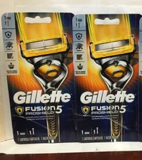 ( 2)  Gillette Fusion ProShield Razor, Handle & Blade Refill,1 Razor,1 Cartridge