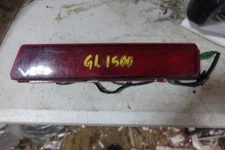 HONDA GOLDWING 1500 LEFT TRUNK BRAKE TAIL LIGHT  CHIPS ON CORNER LENS