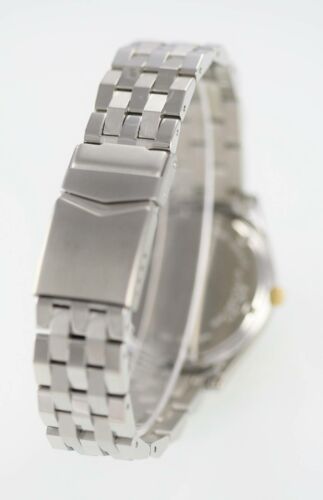 Montre Seiko Homme Jour Date Argent Or Acier Inoxydable Batt Water Res Gris Quartz - Photo 3 sur 3
