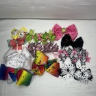 JoJo Siwa mixed with other bows and matching smaller bows.