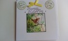 Handmade mothers day card with a tiered picture of a cute wren and a yellow bow.