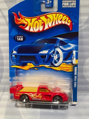 2000 HOT WHEELS #148 = PIKES PEAK TACOMA  = RED    , 1911