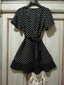 black spotty wrap dress