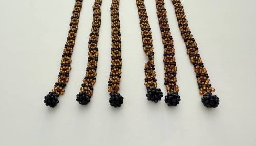 Hecho a mano con cuentas de vidrio negro ámbar bronce tejido floral pulsera servilletero lazos - Imagen 8 de 12