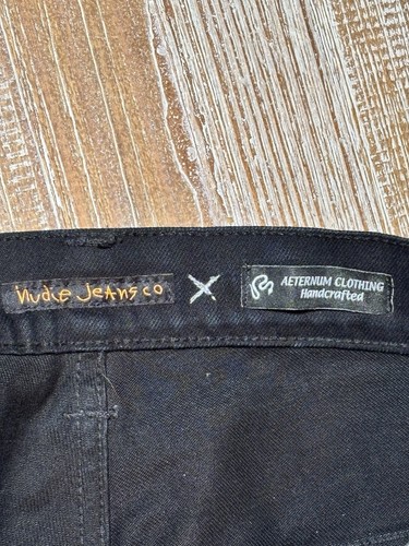 NUDIE JEANS Co Thin Finn Slim Black Ring Jack Daniel’s Denim Jeans Sz 31x34 - Picture 8 of 20