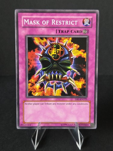 Yugioh Trap - Mask of Restrict - Unlimited - DB1-EN221 - Near Mint Vintage - Picture 1 of 2