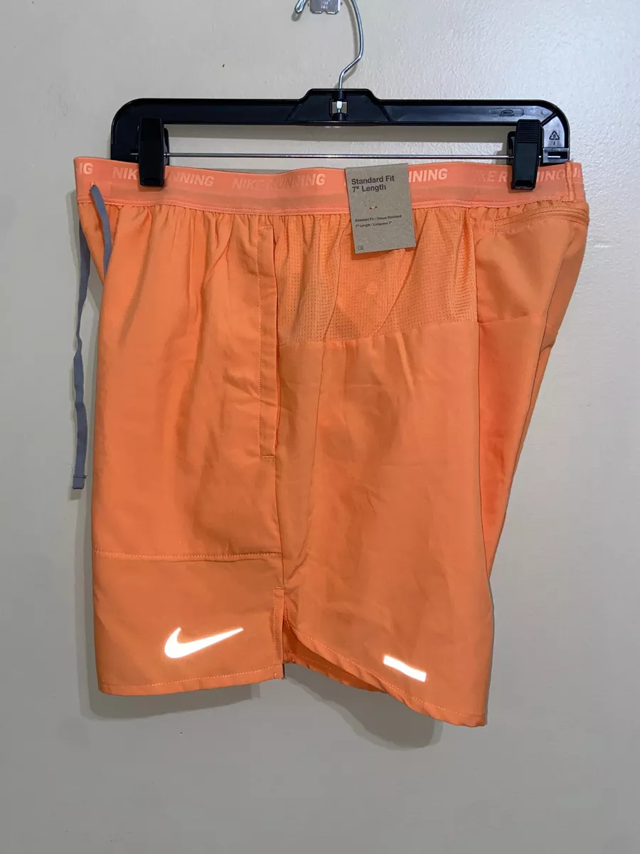 Orange nike top running shorts