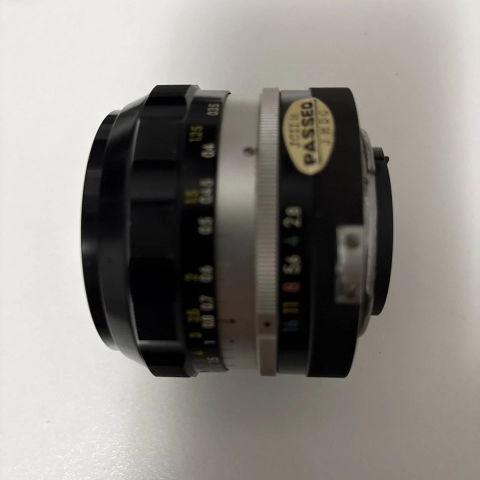 Lente gran angular Nikon NIKKOR-N automática 24 mm F2,8 con tapas excelente Foto 3 de 4