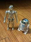 vintage 1977 Kenner Star Wars C-3PO and R2-D2 action figures