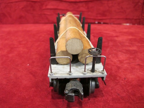 postwar LIONEL 2411 LOG OR PIPE CAR CAR with log load & working trucks - Picture 3 of 11