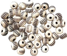 Buffalo Bone Spacer Beads, 50 Pcs, Near Rounds, White with Carving, 7mm by 10mm