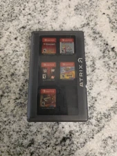 Nintendo Switch Assorted Game Cartridge Set in Atrix Case With Thumb Grips