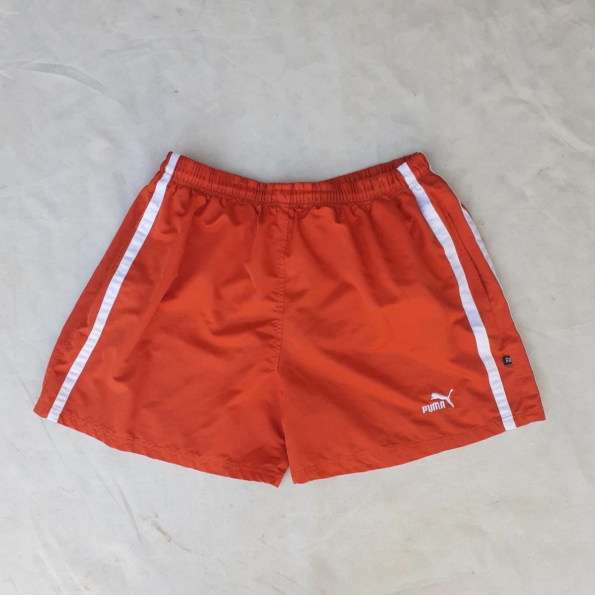 Puma track cheap shorts orange