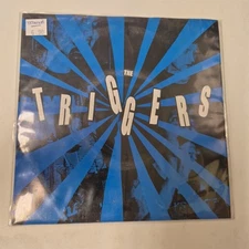 THE TRIGGERS- FLIP-TOPS 7" 45 RPM RECORD BRAND NEW