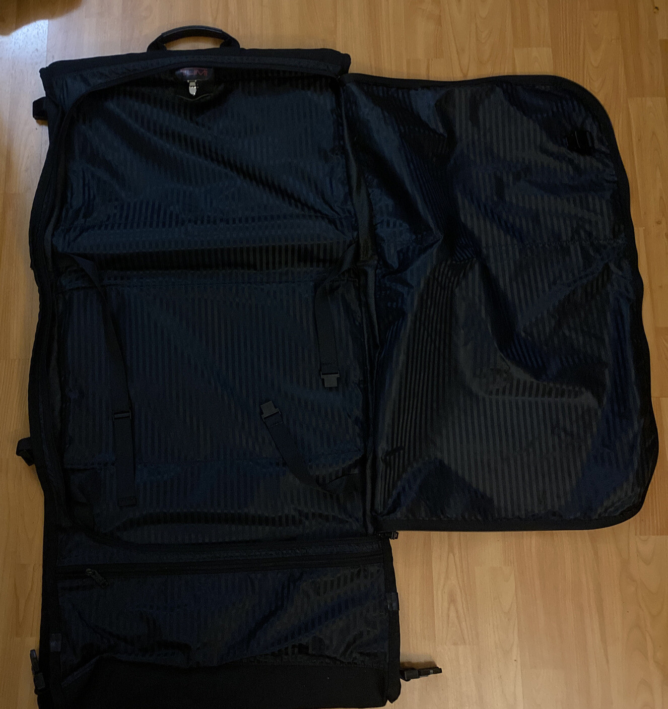 TUMI Tri-Fold 42\