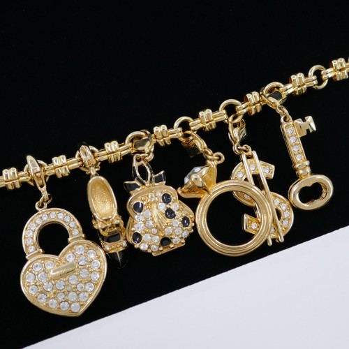 SWAN SWAROVSKI CRYSTAL GOLD-PLATED CHARM BRACELET PURSE SHOE RING LOCKET KEY $ - Picture 5 of 8