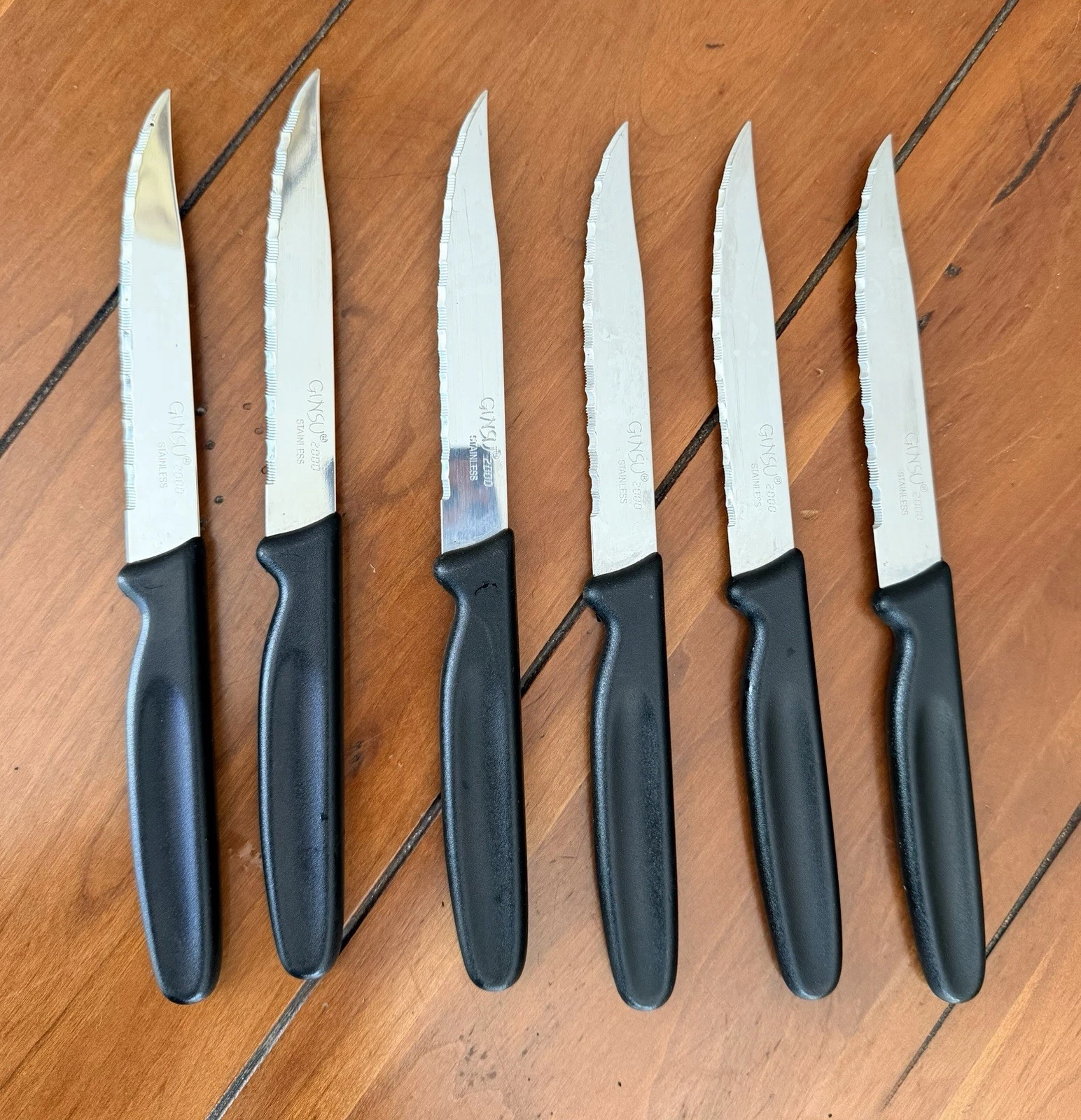 Vintage Ginsu 2000 Steak Knife Set of 6 Serrated Stainless Black Handle Knives
Opens in a new window