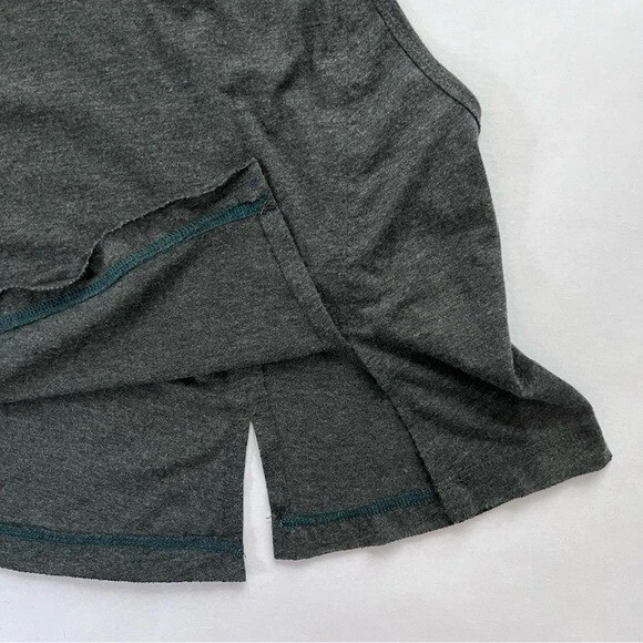 free-people-movement muscle mesh back panel hem slits tank-top