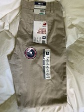 IZOD boys School Uniform Flat Front Tough Cotton Stretch Khakis, 16 Husky