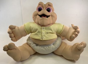 baby sinclair peluche