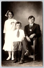 Postcard RPPC Sister and Brothers with Boutonnieres Hat Real Photo Siblings