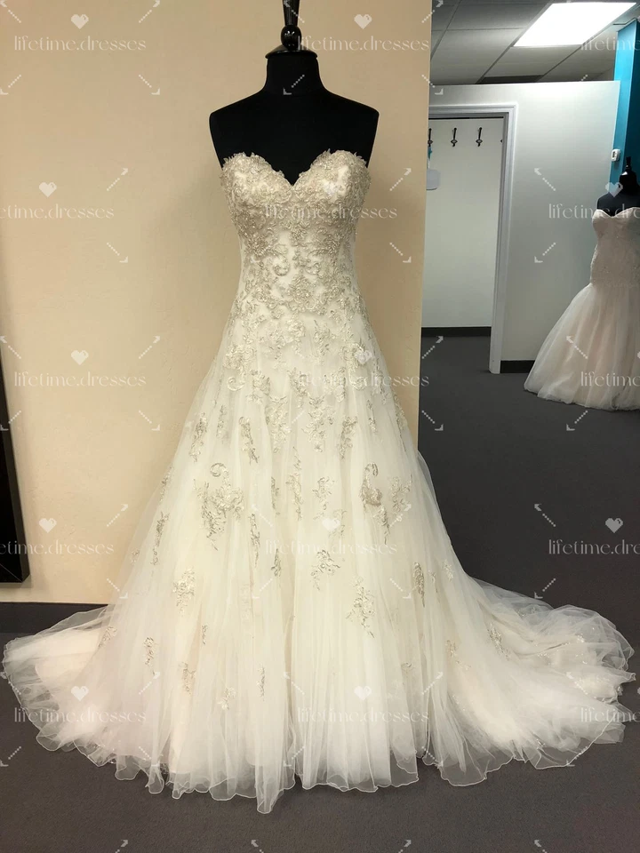 Vestidos de novia vintage sin mangas de tul con cordones con hombros descubiertos Foto 2 de 4