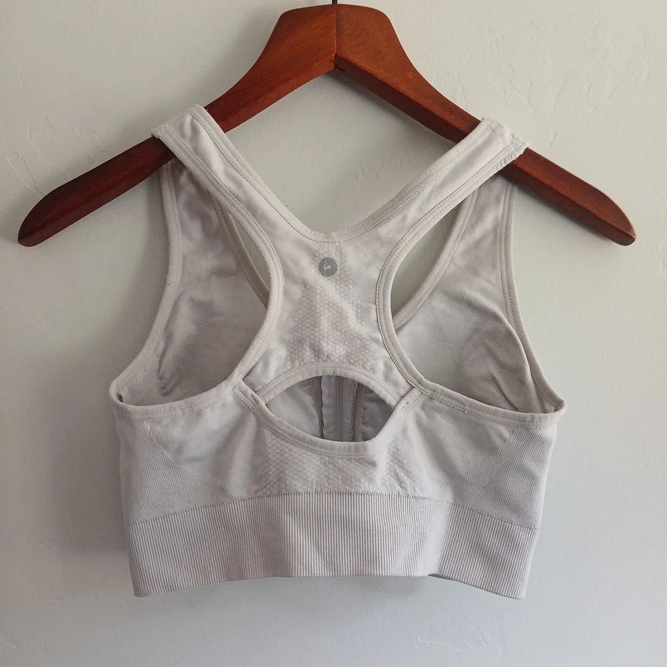 Sujetador deportivo Danskin mediano blanco acolchado espalda deportiva cremallera frontal ocio Foto 2 de 3