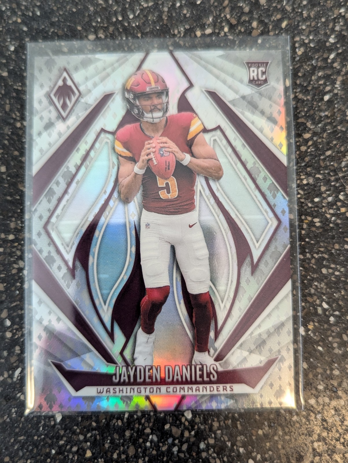 2024 Panini Phoenix - Rookies Jayden Daniels #198 Phoenix Logo /399 (RC)