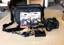 Nikon D3300 Camera and assessories and two new San Disc