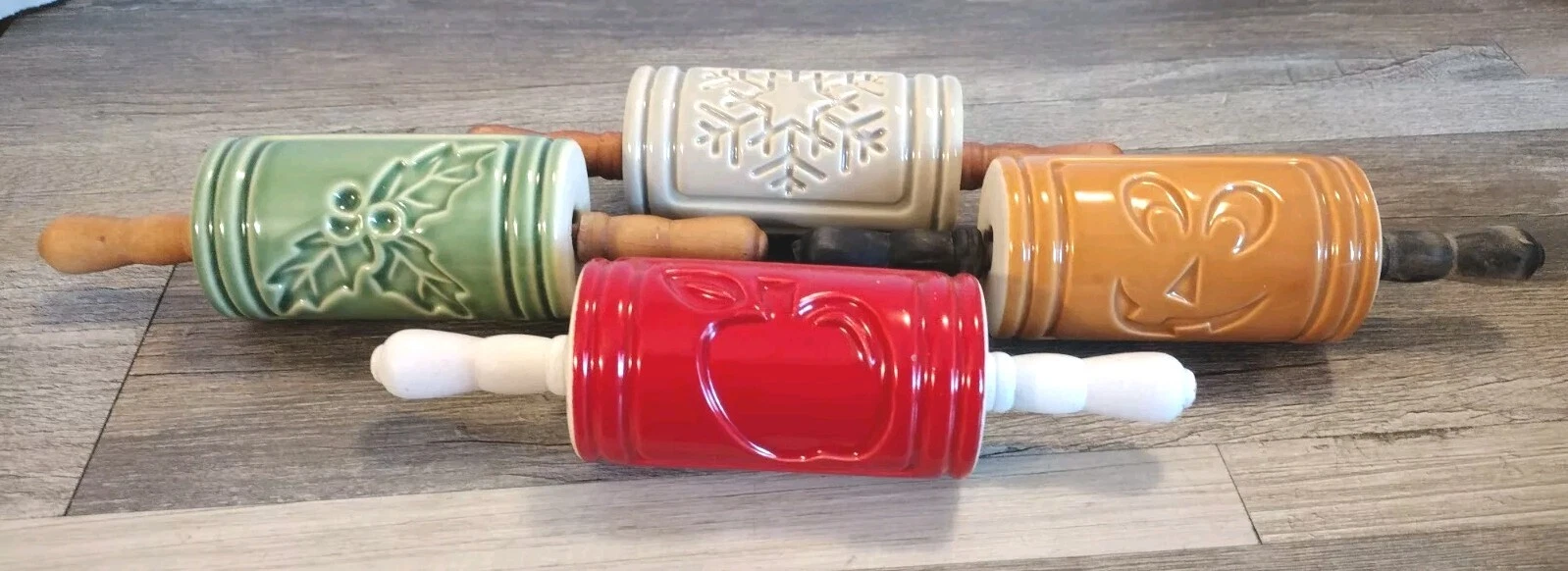 4 VTG Holiday Ceramic Rolling Pins Wood Handles Embossing Holly Leaves.....
Opens in a new window or