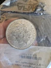 1887 Morgan Dollar - BU, in clear APMEX bag