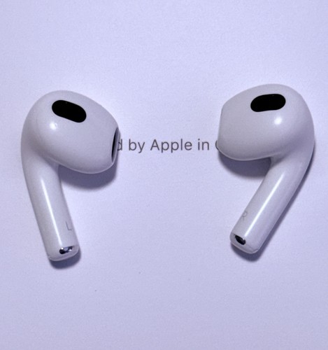 Apple AirPods (3rd generation) with Magsafe Wireless Charging Case - Photo 9 sur 19