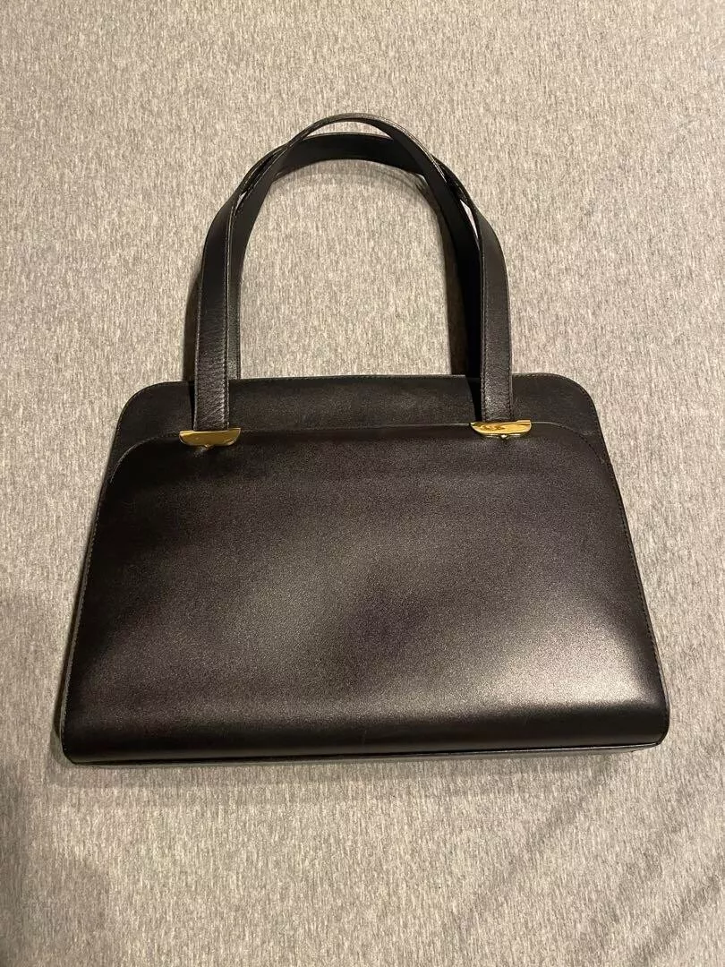 Sac à main Christian Dior logo CD cuir noir occasion