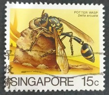 Used world stamp Asia Singapore 1985 Insects the yellow potter wasp Delta arcuat