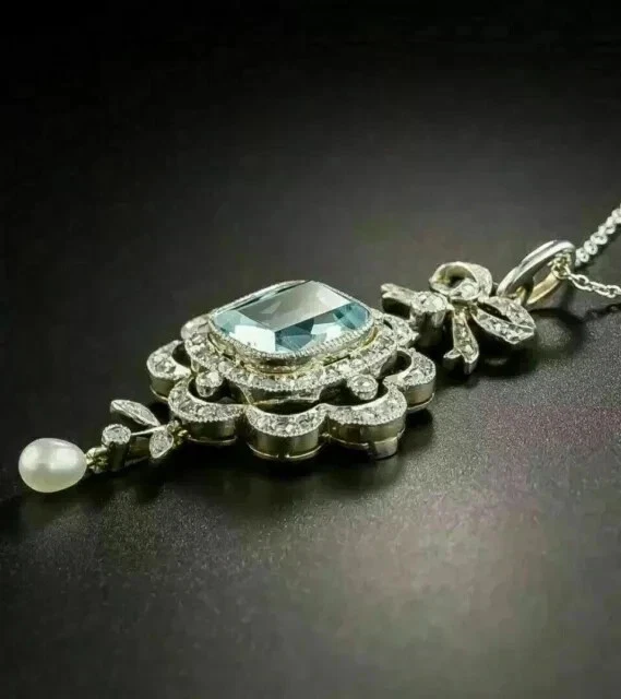 Colgante de halo de aguamarina simulada con cojín de 2,5 quilates enchapado en oro blanco de 14 quilates cadena de 18" Foto 3 de 3