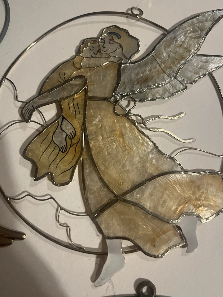 Atrapasoles de colección; John Deere, pato mallardo, ángeles abrazados, loro y linterna Foto 3 de 4