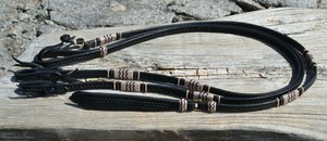 SALE-5-8-034-Jose-Ortiz-Flat-Black-Tooled-Romel-Reins-with-Natural-Latigo-Rawhide