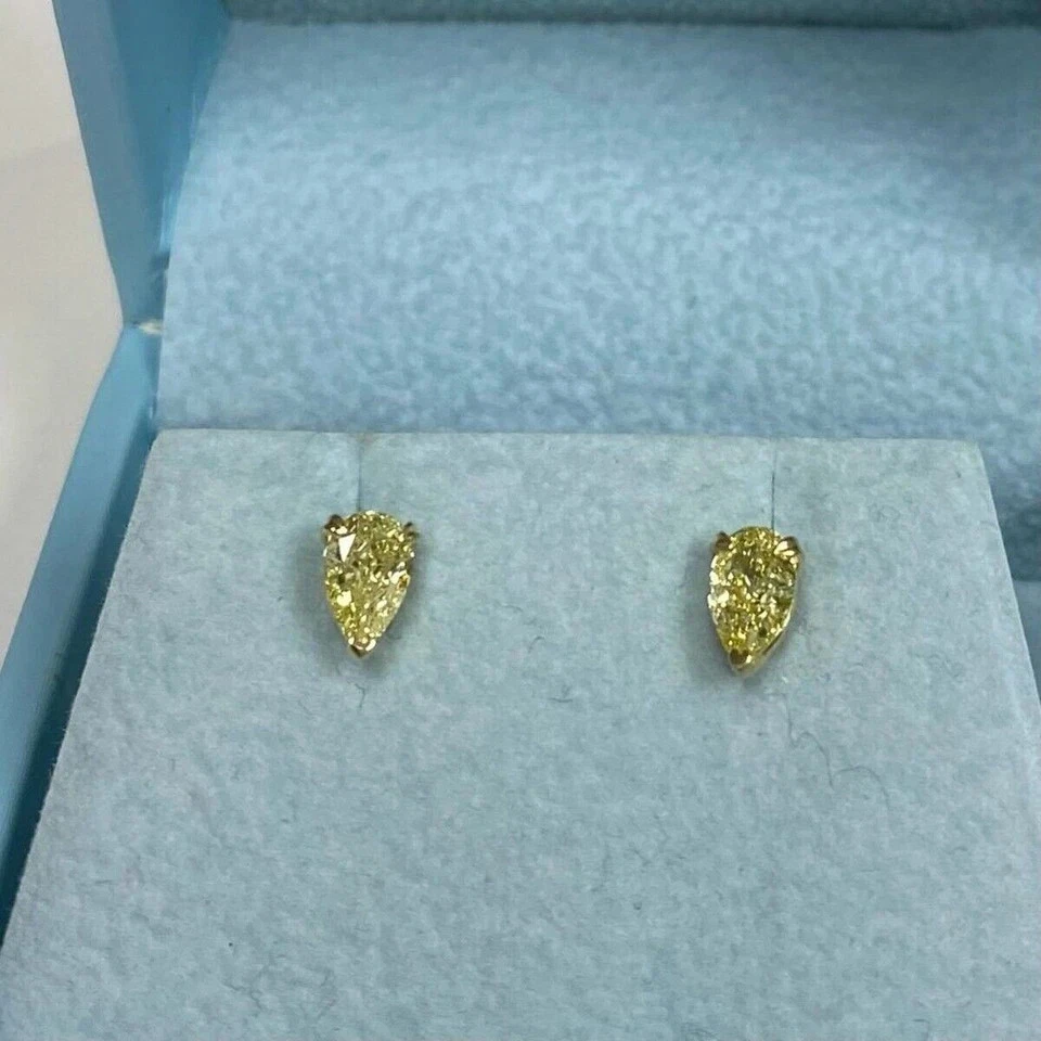 Aretes de diamantes amarillos vivos de lujo cultivados en laboratorio con corte de pera de 2 quilates de oro amarillo de 14 k Foto 3 de 4