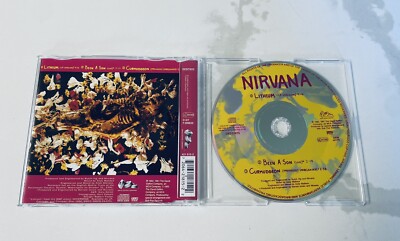 Authentic 1995 'Singles by Nirvana' CD Box Set - Like New Authentic 1995 'Singles by Nirvana' CD Box Set - Like New