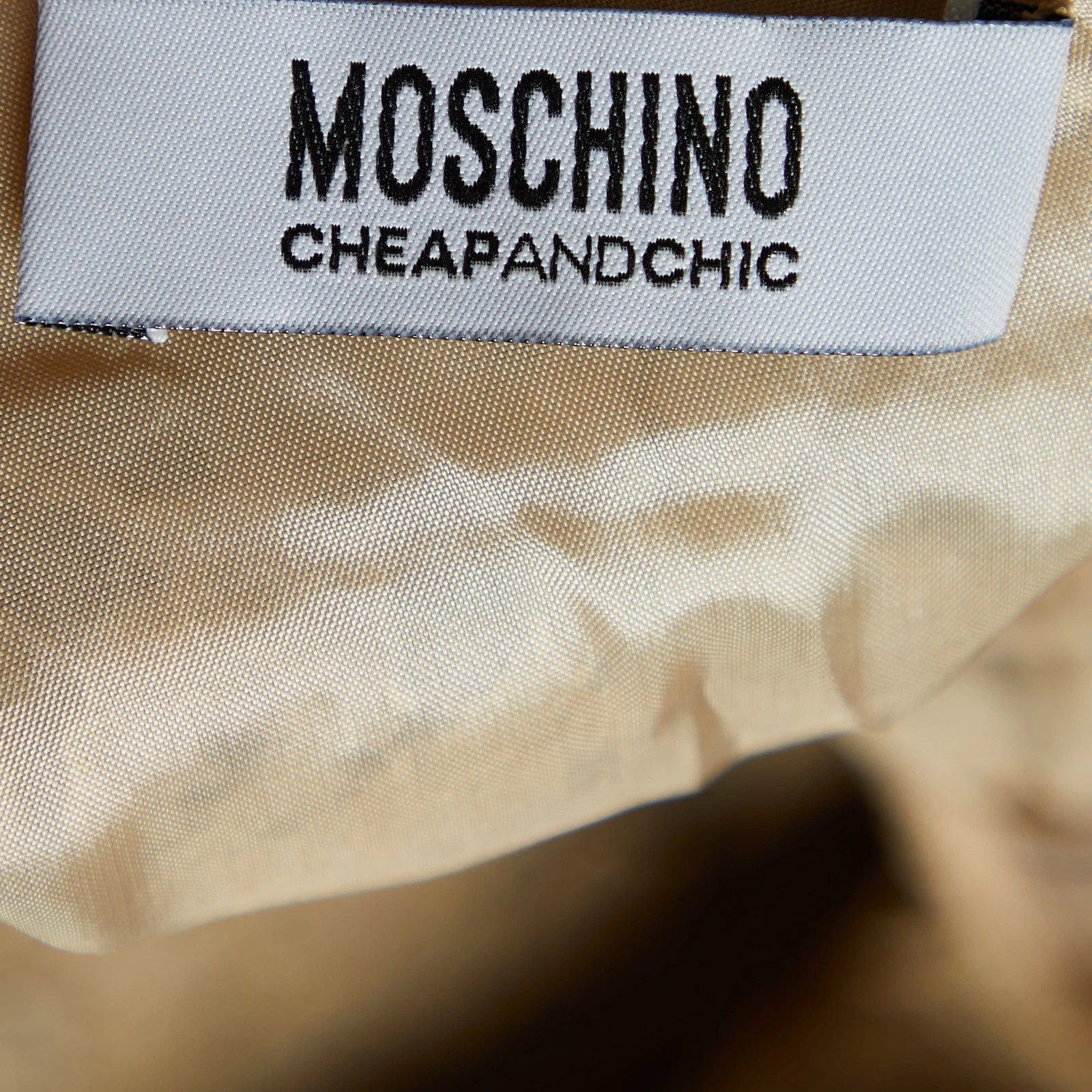 Abito Midi Moschino senza maniche beige economico e chic vernice dettaglio fiocco L
