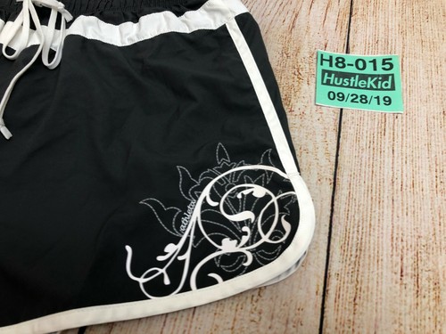 Pantalones Cortos ATHLETA Mujeres Correr Atléticos Yoga Pista Floral Flor Negro Mediano M❄️ - Imagen 4 de 10