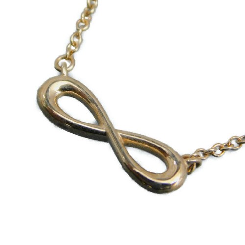 Tiffany & Co. Collar de cadena colgante pequeño infinito de oro amarillo de 18k con caja - Imagen 5 de 24