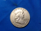 1961-D Franklin Half Dollar (yellow-orange/red)