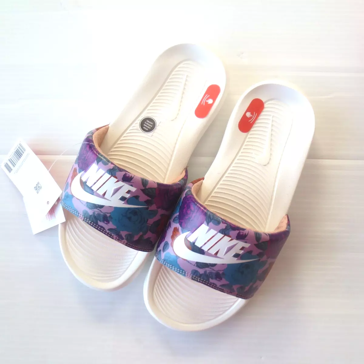 Nike hotsell floral sliders