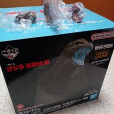 New, unused, unopened Godzilla figure with bonus